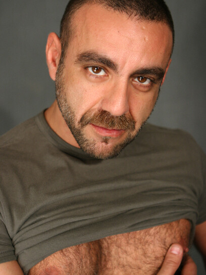 Hairy mature man Manu Maltes shows his uncut cock