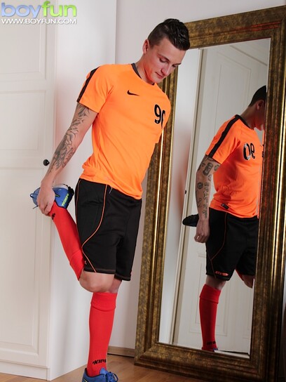Tattooed boy Dom Ully jerks off with his Nike shoe.