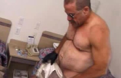 Muscled Gay Bear Masturbates In Uniform